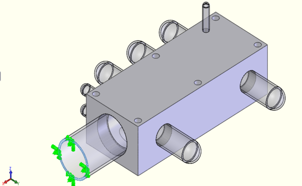 The manifold and all pipes are pressurized on the inside. Here a pressure of 300 psi is applied to the inside of all the manifold and pipe surfaces